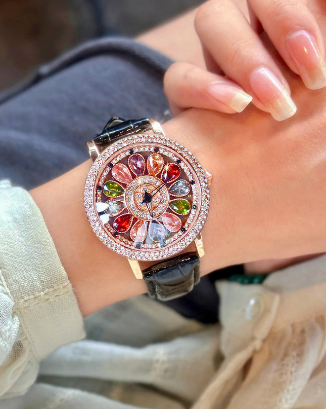 Funkelnde und modische Damen-Quarzuhr mit farbenfrohen Strasssteinen, einem attraktiven drehbaren Zifferblatt und robustem Design.